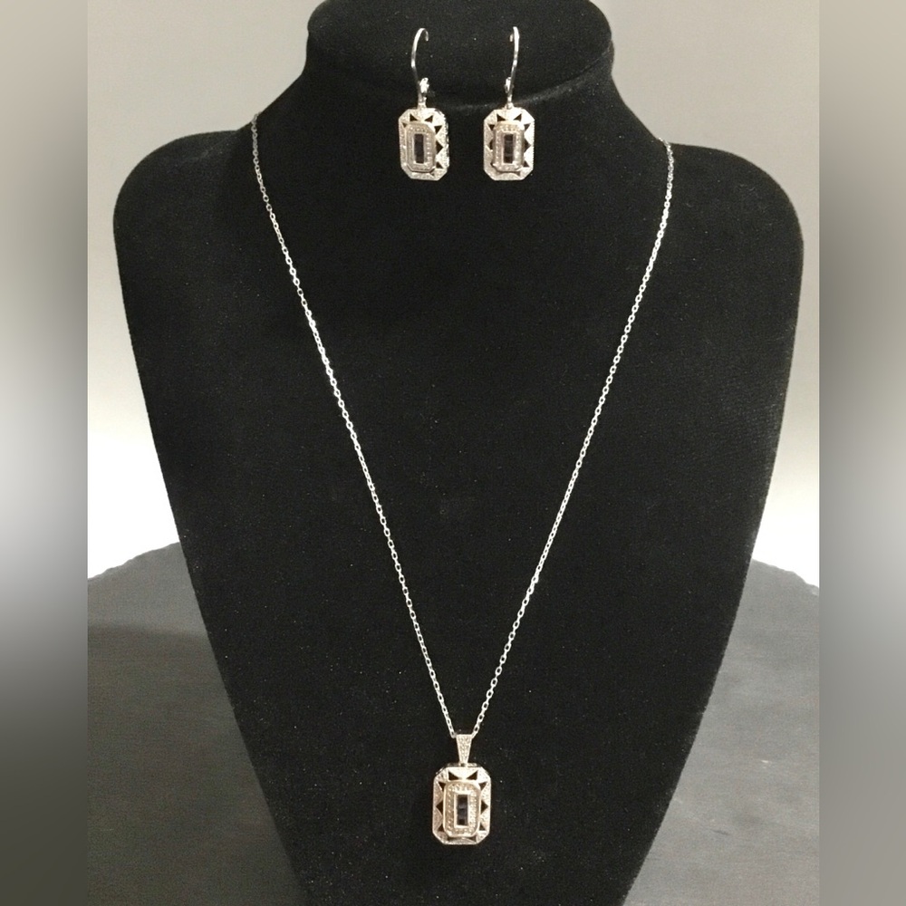 Sapphire and diamond solid 14K gold and sterling silver set
